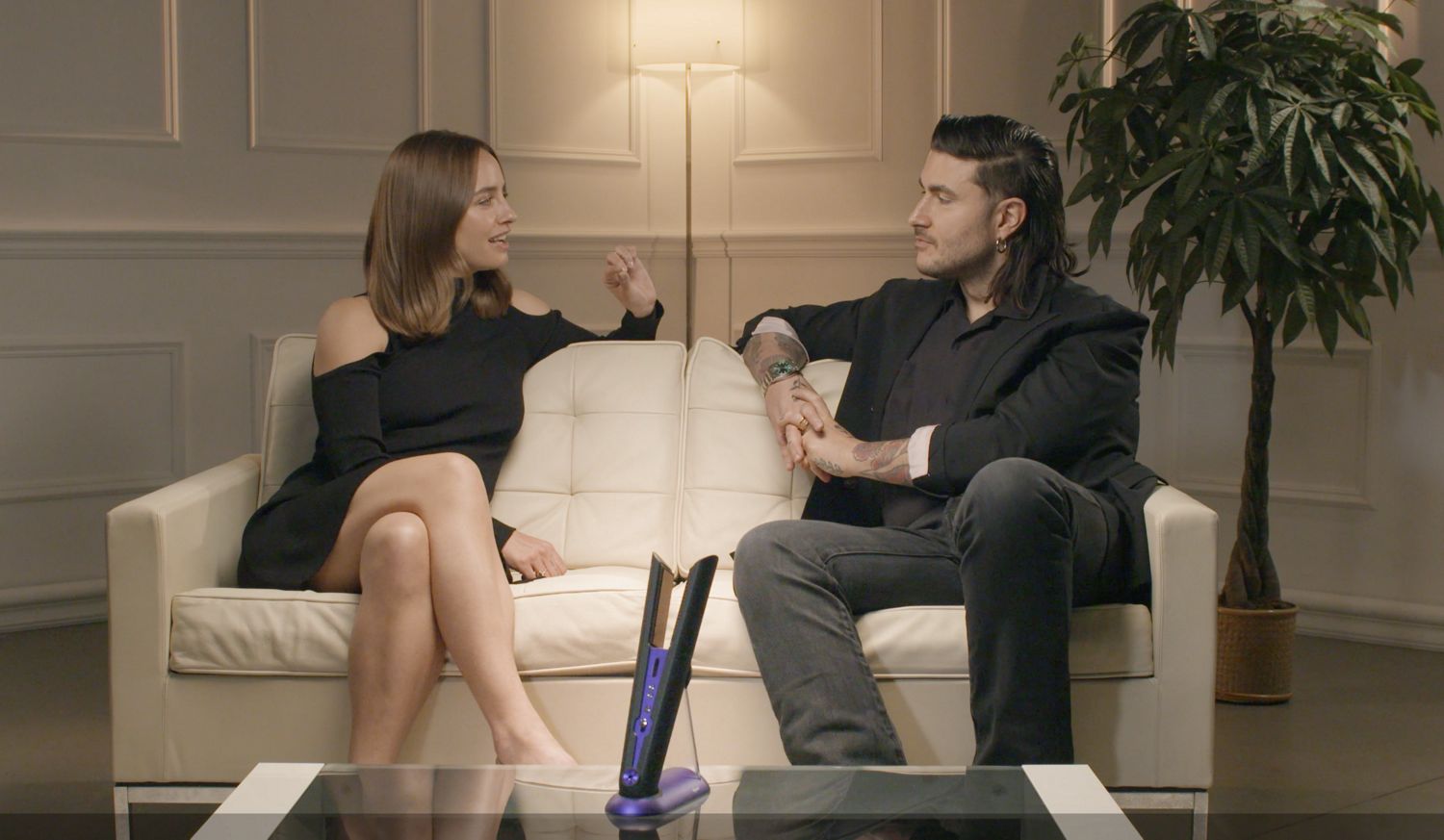 A model get their hair styled.